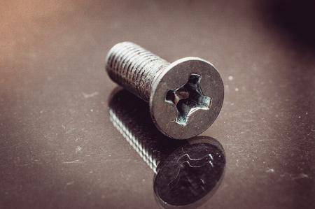 Bolts and nuts on the table