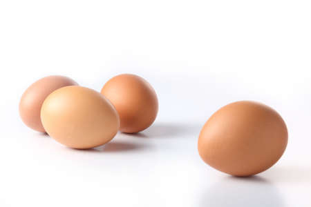 Four eggs isolated on white backgroundの写真素材