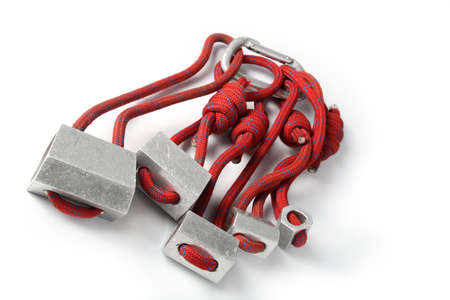 Rock climbing equipment on white backgroundの写真素材