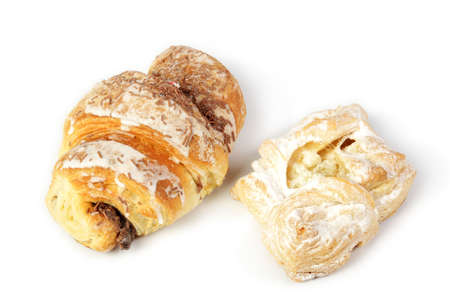 Croissant and apple pie isolated on a whiteの写真素材