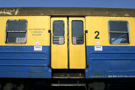  vintage blue and yellow train on a station, Polandの写真素材