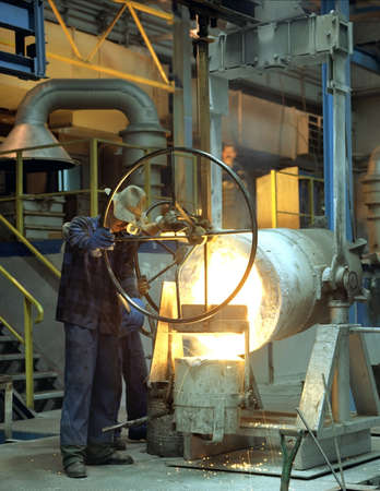 Iron foundry in Klodzko, Poland- moulder at workの写真素材