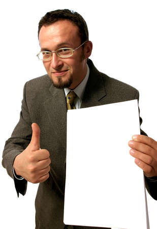 Young handsome  businessman holding  a blank sheet of paper and making an OK sign.の写真素材