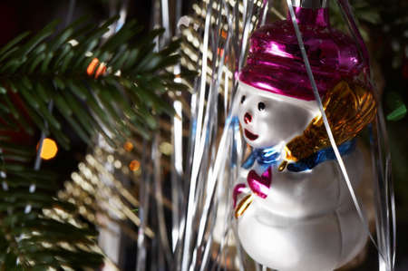 Traditional christmas decoration in close up with snowman bauble.の写真素材