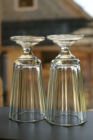 Two empty clean stylish glasses in close up view.の写真素材