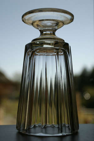Empty clean stylish glass up side down in close up view.の写真素材