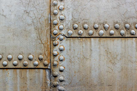 Rusted metal texture with rvets.