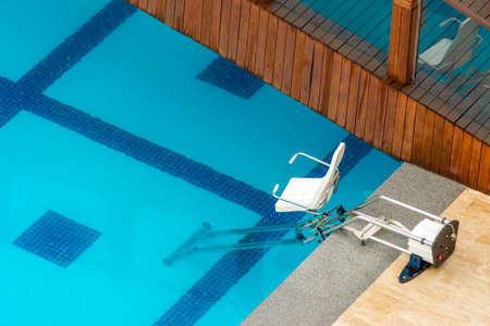 Wheelchair, Wheelchair for the descent into the pool.の写真素材