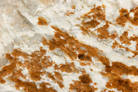 White brown marble stone with a crack. Untreated marble stone texture, closeup.の写真素材