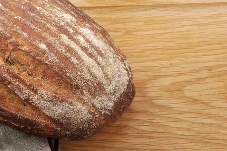 black bread on wooden background. top viewの写真素材