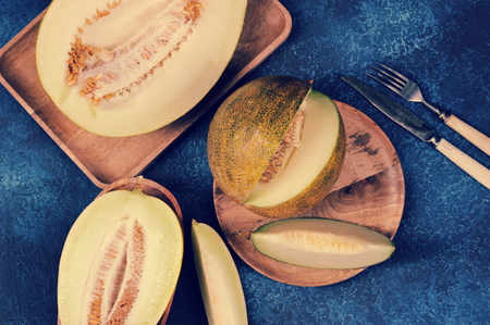 different varieties of melon, melon cut in half and into pieces-top viewの写真素材