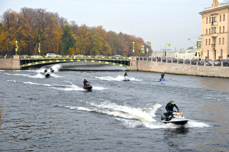 St.-Petersburg, Russia - October 17, 2018: ride on water scooters on the river fountain near Panteleevsky bridge in St. Petersburgのeditorial素材
