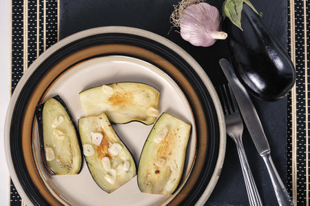 fried eggplant with garlic - top viewの写真素材