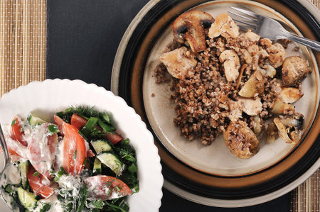 dish with chicken and champignons and buckwheat - top viewの写真素材