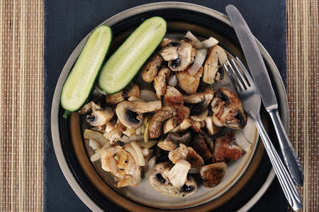dish with chicken and champignons - top viewの写真素材