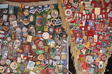 Moscow, Russia - July 19 2022: sale of metal badges at the flea market in Izmailovo in Moscowのeditorial素材