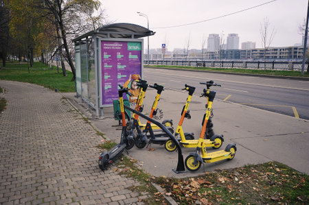 Moscow, Russia - October 23, 2022: rental scooters on the Nagatinskaya embankment in Moscow