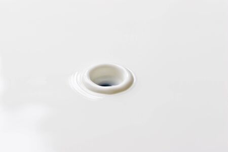 Milk drop creates ripple structure on surface