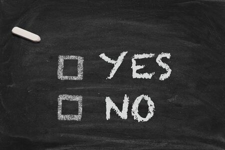 High resolution black chalkboard image with decision form. Conceptual image for decision or democracy themes.の写真素材
