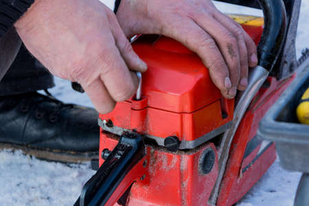 Chainsaw, repair and maintenance.の写真素材
