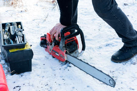 Chainsaw, repair and maintenance.の写真素材