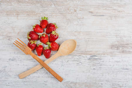 Summer vitamin food. Lots of fresh ripe fragrant strawberries. Food causing allergies. Flat lay, Copy spaceの写真素材