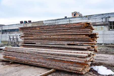 Sawmill A stack of wooden boards in the open air. Sawing, lumber.の写真素材
