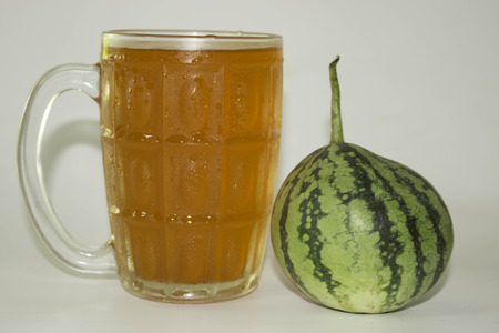 Tea and watermelon on a white background.