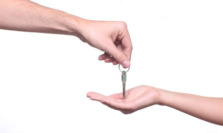 Moment of presenting a key.の写真素材