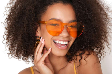 Portrait of woman with orange eyeglasses.の写真素材