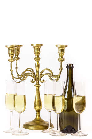 Elegant, simple image. Glasses of champagne and candelabra. For new years eve celebration and special moments. Copy space for text.の写真素材