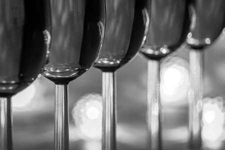 Close up of glasses of white wine. For celebrations and special moments. Decoration light in...