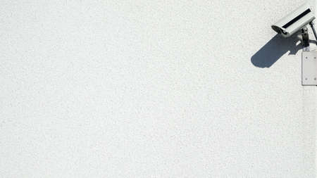 CCTV. Surveillance camera on concrete wall. Blank empty copy space for own text.の写真素材
