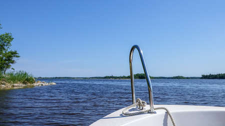 Cleat / bollard on a boat with the sea in the background. Background with copy space for text.の写真素材