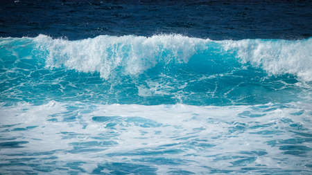 Large turquoise wave in the sea. Lanzarote, Canary Islands.の写真素材