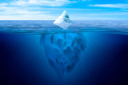 Tip of the iceberg. Underwater iceberg floating in ocean.