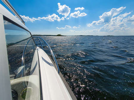 White boat at blue sea. Relaxing vacation, travel and sea concept.の写真素材
