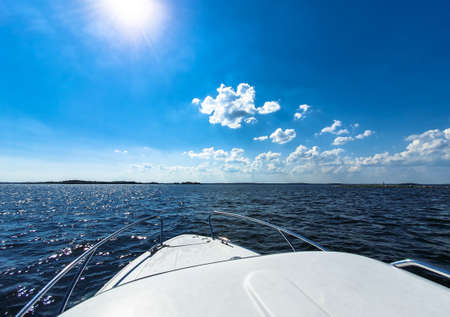 White boat at blue sea. Relaxing vacation, travel and sea concept.