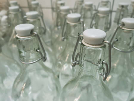 Retro bottle. Empty old glass bottles background.の写真素材