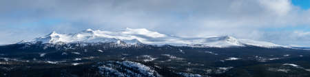 Winter landscape with dramatic snowy mountains. Panoramaの写真素材