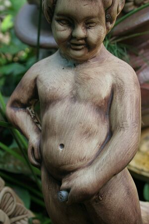 Kid Sculpture in gardenの写真素材