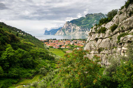 Summer scenic view on the small Italian mountain village in the valley near lakeの写真素材