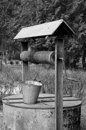  Old well for water on a cemetery  B W の写真素材