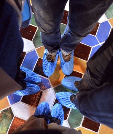 people's feet wearing booties