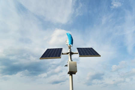 Solar panels and a small wind generator for the production of environmentally friendly energy