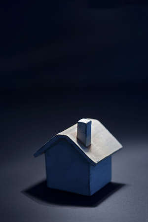 Toy house in blue light, looks like midnight の写真素材