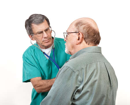Male doctor listening to older man's heart with stethoscope. Closeup shot, white background.
の写真素材
