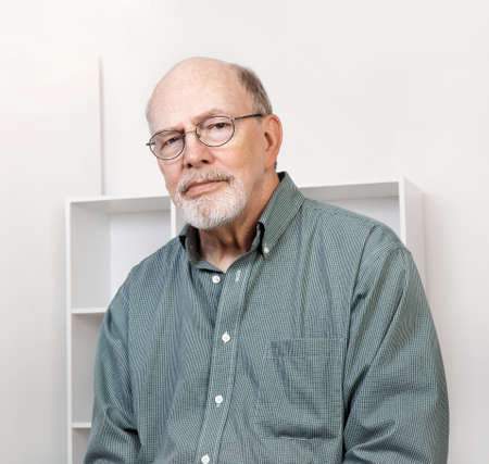 Pleasant looking senior caucasian man closeup portrait.の写真素材
