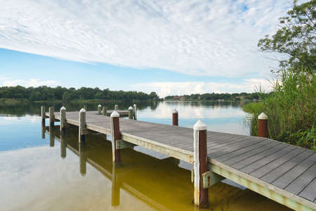 Peaceful Fishing Pier on Bayouの写真素材