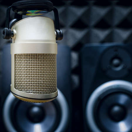 microphone and audio monitors in the studioの写真素材